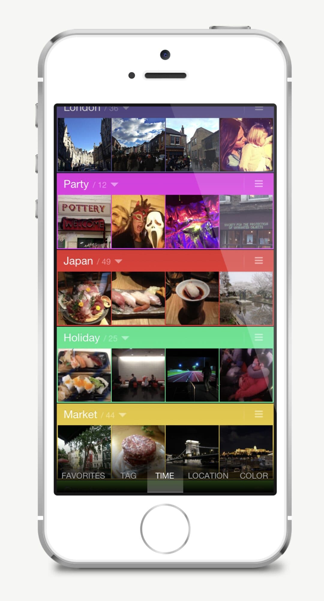 Instants on an iPhone 5s: colour-coded groups named London, Party, Japan, Holiday and Market